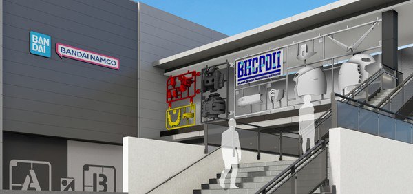Oversized Gundam model kit parts at museum entrance